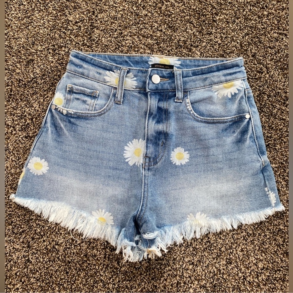 MATERIAL Girl distressed, cutoff denim jean shorts with daisies. Size 7